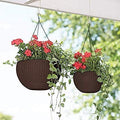 GoHooked brown plastic rattan hanging basket with metal chain, holding red flowers and green vines.
