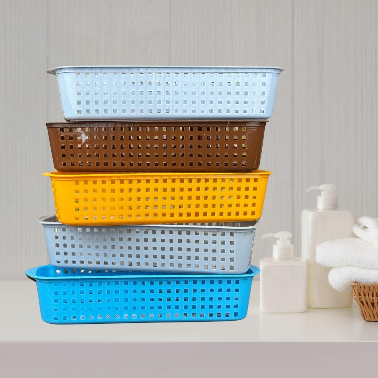 GoHooked multicolour plastic storage baskets, pack of 5, stackable, perforated design for bathroom organization.