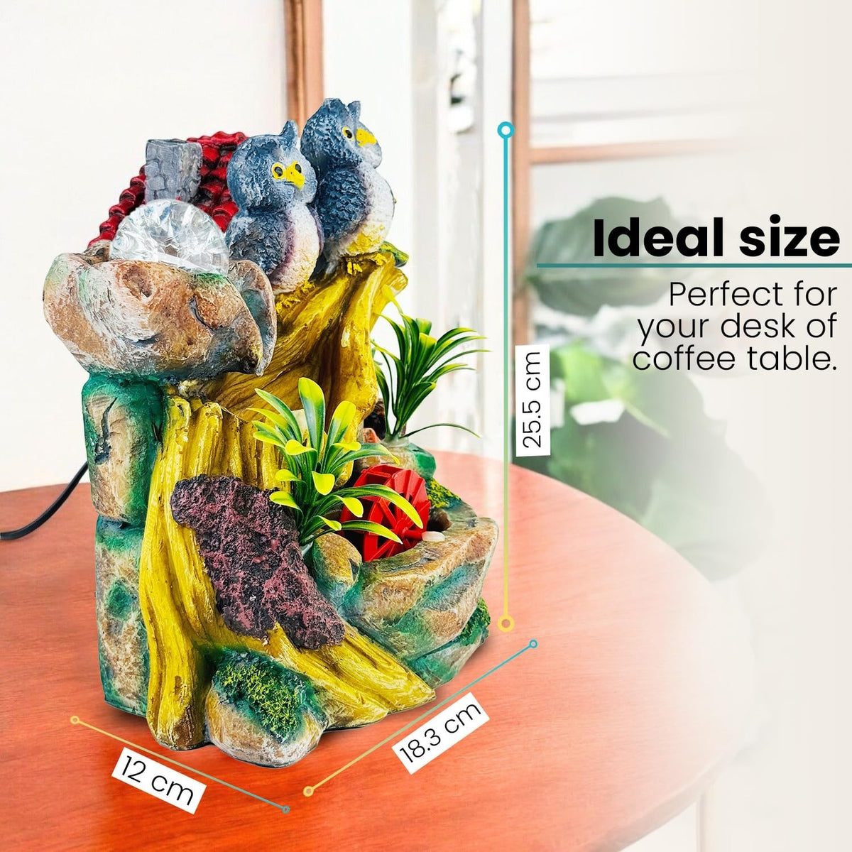 GoHooked multicolour polyresin tabletop waterfall fountain with two owls, LED lights, and adjustable speed. Ideal for living rooms, bedrooms, and offices.