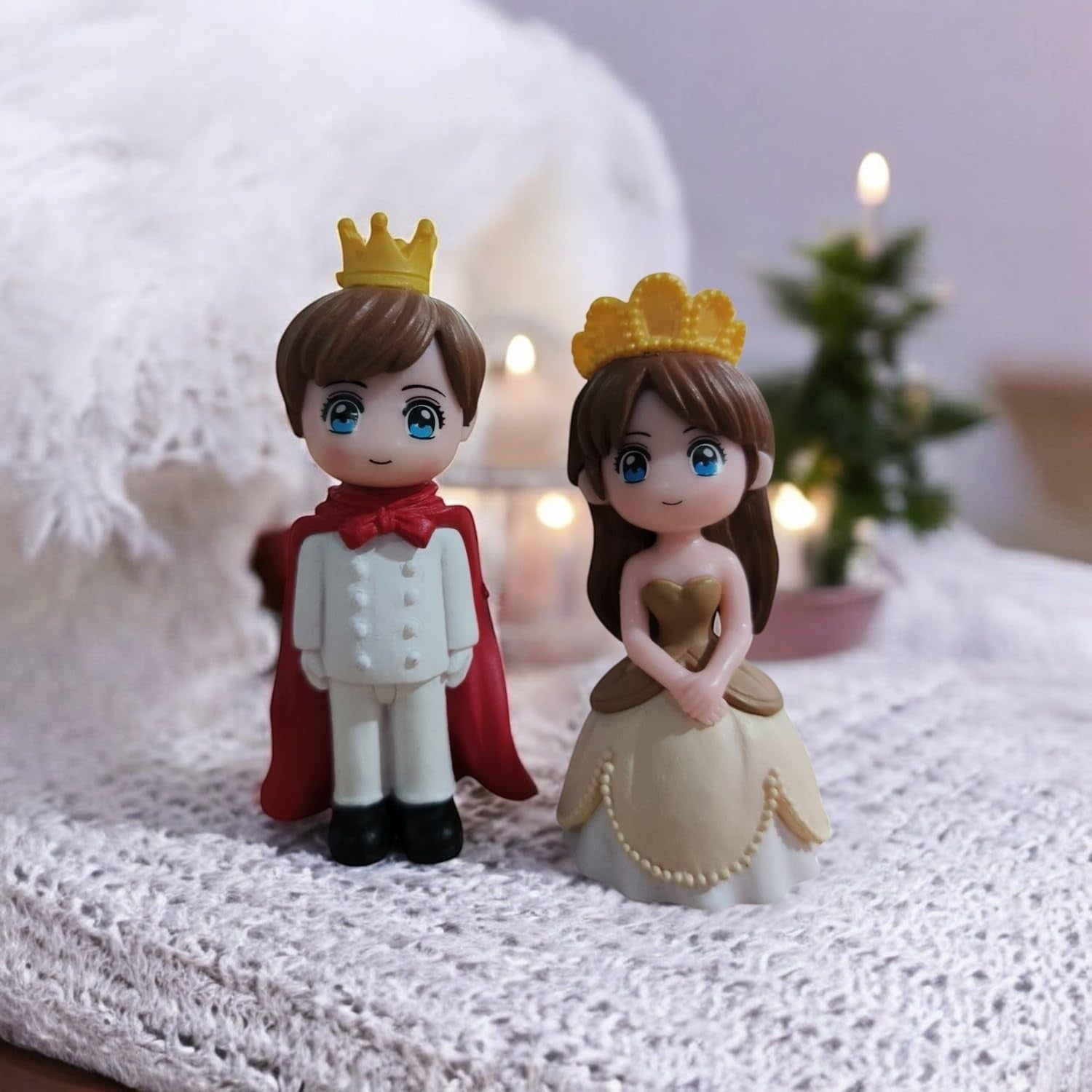 Go Hooked Prince and Princess couple figurines in resin, wearing crowns and royal attire. Ideal for cake decoration or home decor.