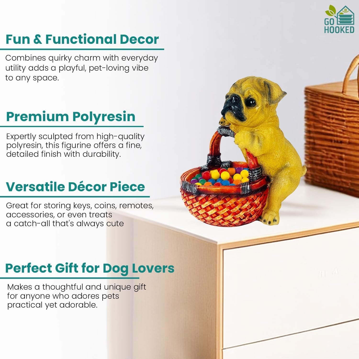 GoHooked yellow pug dog figurine holding a basket filled with colorful balls, made of resin.