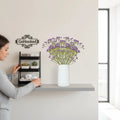 GoHooked 5pcs purple artificial baby's breath flowers in a white vase on a shelf. Realistic rubber flower heads and plastic stems.