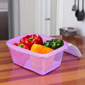 Go Hooked purple plastic storage basket with zip net cover, holding bell peppers and other vegetables.