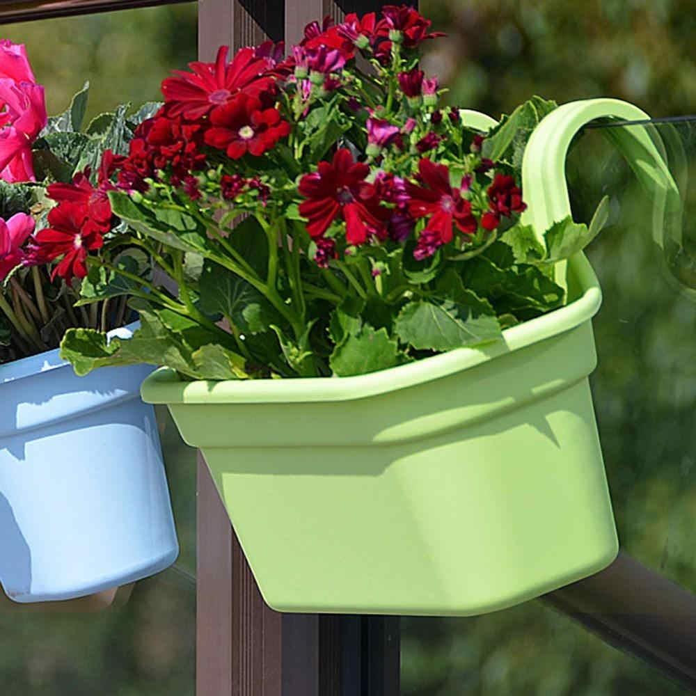 GoHooked light green plastic railing planter with red flowers, featuring double hooks and drainage hole.