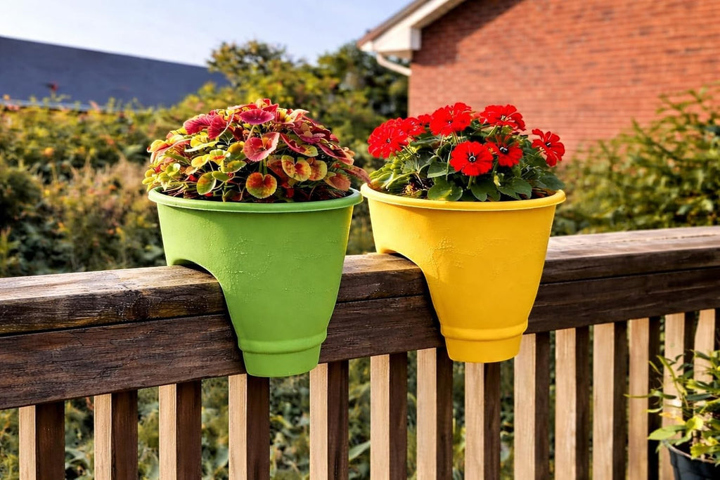 Go Hooked set of 2, 12-inch plastic railing planters in lime green and yellow, holding vibrant flowers.