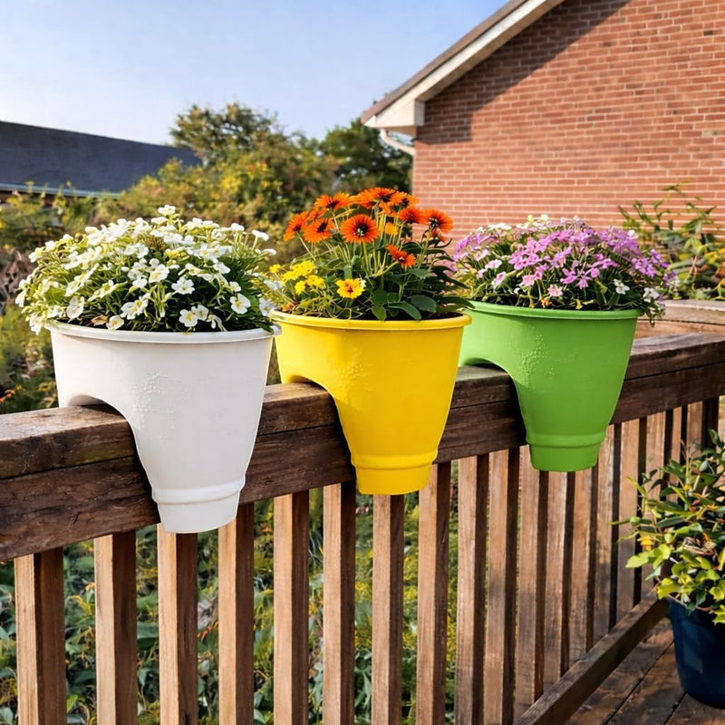 GoHooked white, yellow, and green 12-inch plastic railing planters filled with flowers, set of 2.