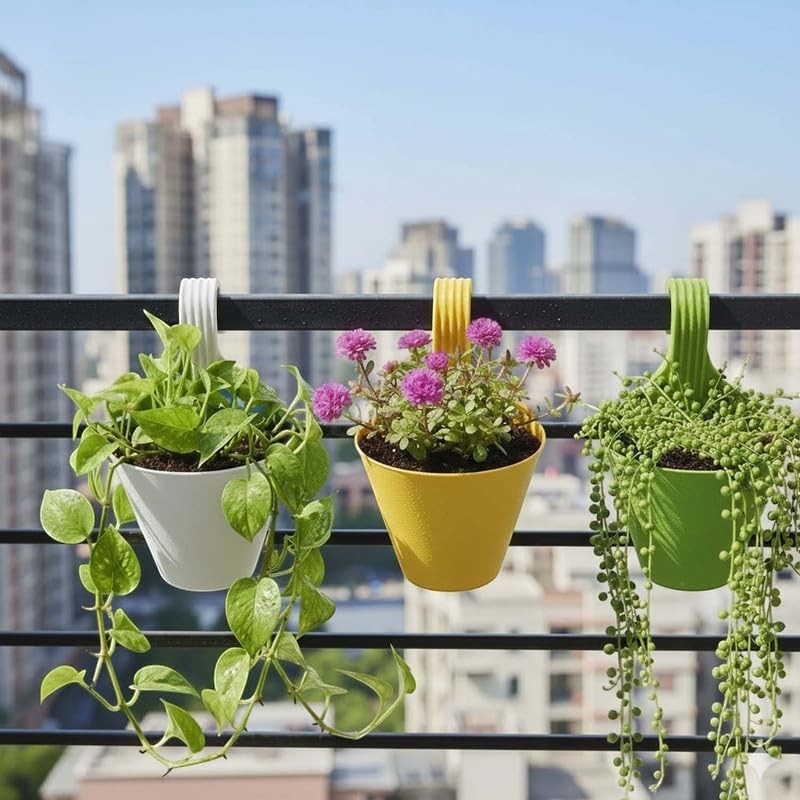 GoHooked set of 3 multicolor plastic railing planters with green, yellow, and white hooks, holding various plants.