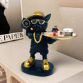 GoHooked black polyresin rapper bulldog statue holding a gold tray with makeup and accessories. Features gold accents.