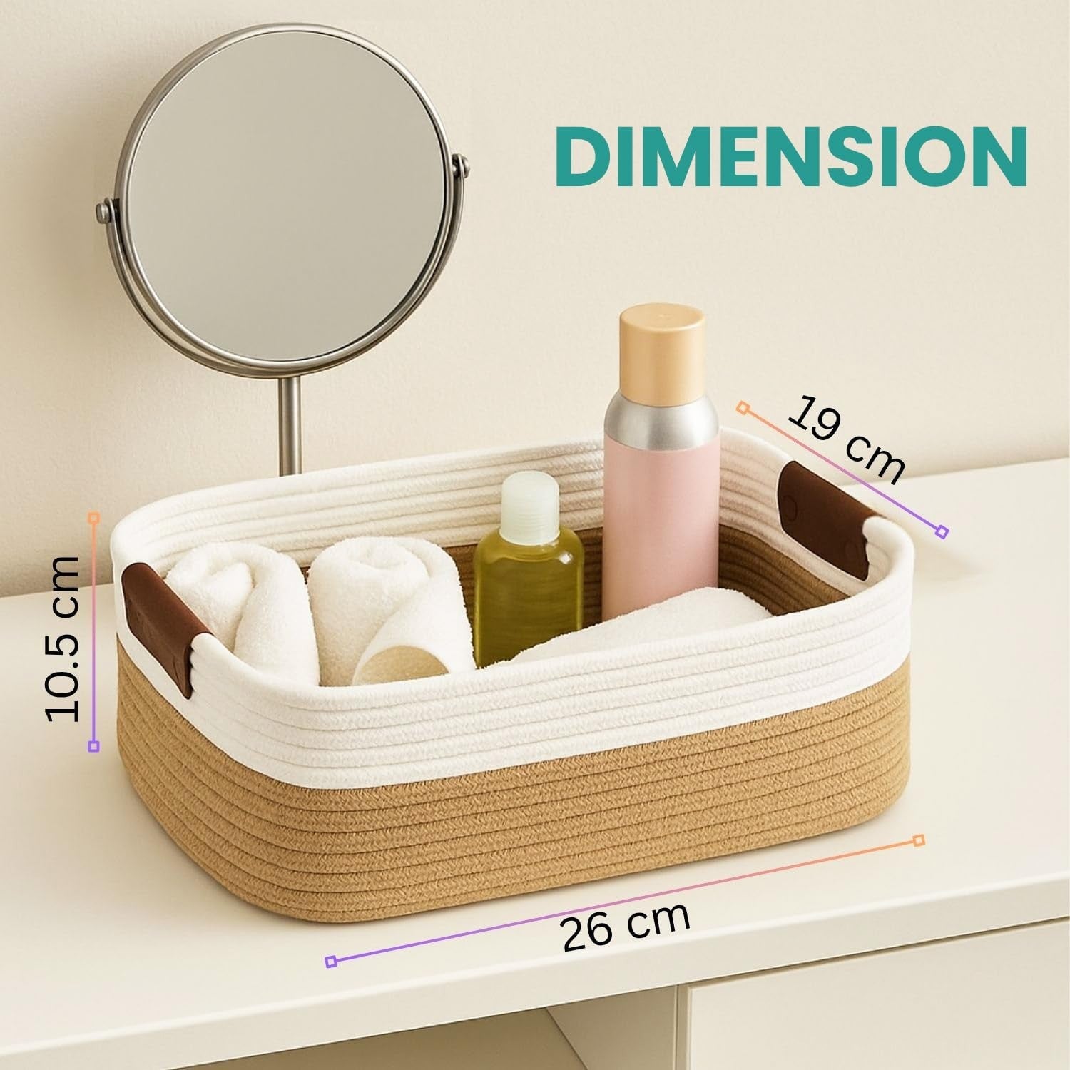 GoHooked beige and white rectangular cotton rope storage basket with brown handles, holding towels and toiletries.