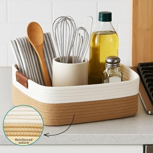 GoHooked beige and white rectangular cotton rope storage basket with brown handles, holding kitchen utensils and toiletries.