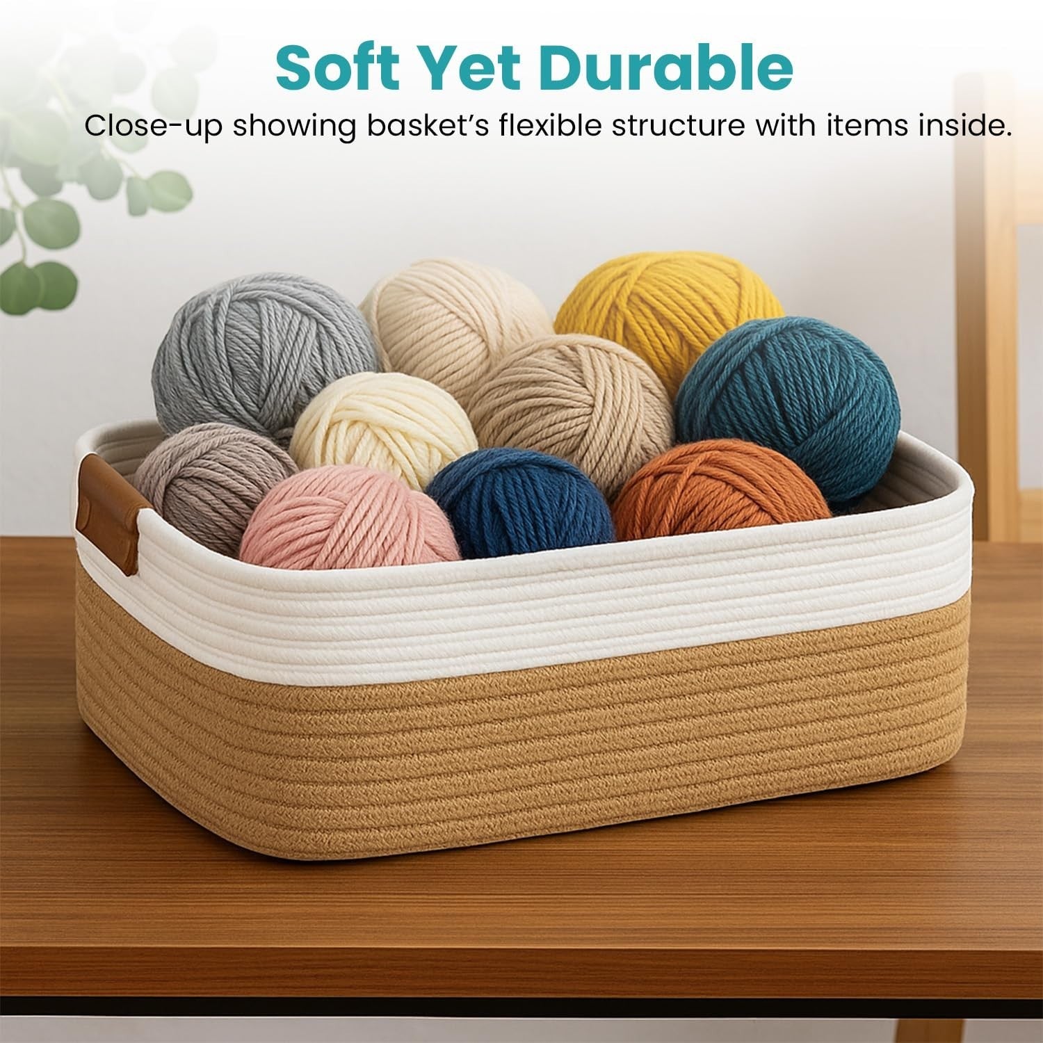 GoHooked beige and white rectangular cotton rope storage basket with soft handles, filled with colorful yarn balls.