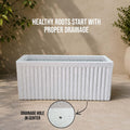 GoHooked rectangular polymer planter pot in marble white with vertical ribbed design and drainage hole.