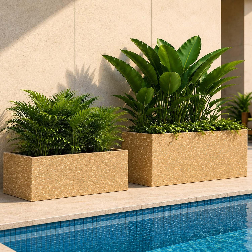 GoHooked rectangular polymer planter set in sandstone finish with lush green plants by a poolside patio.
