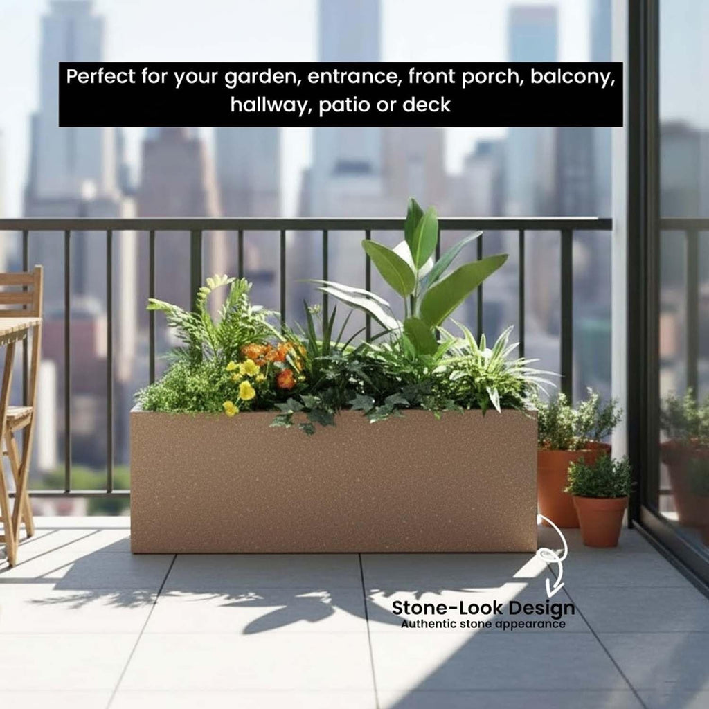 GoHooked rectangular sandstone polymer planter on a balcony with lush green plants and a city skyline background