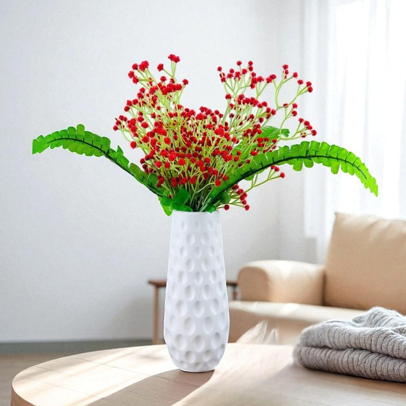 GoHooked red artificial baby's breath flowers with green leaves in a white textured vase.