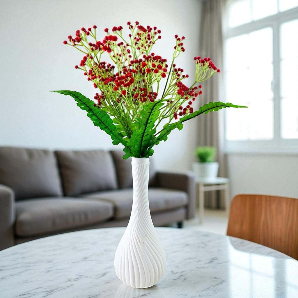 Go Hooked red baby's breath artificial flowers with green fern leaves in a white textured vase.
