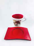 Go Hooked red ceramic cup-shaped planter with rose design and matching saucer, ideal for small plants.