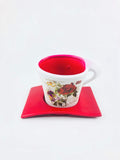 Go Hooked red ceramic cup-shaped planter with rose and script design, includes matching saucer.