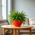 GoHooked red plastic hanging planter with woven texture and metal chain, 8.5 inch diameter
