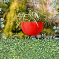 Go Hooked red plastic hanging pot with woven texture, 7.1 inch diameter, for indoor/outdoor use.
