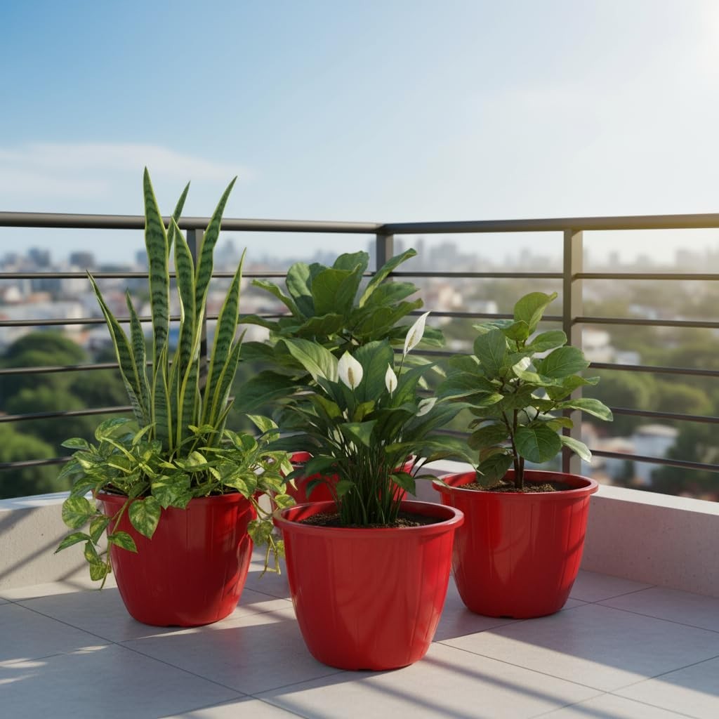 Go Hooked pack of 4 red plastic planters with various plants on a balcony with city view.
