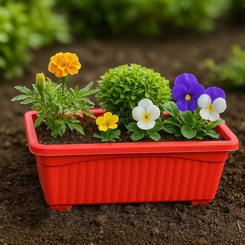 GoHooked red rectangular plastic planter pot with fluted sides, holding marigolds, pansies, and a small green plant.