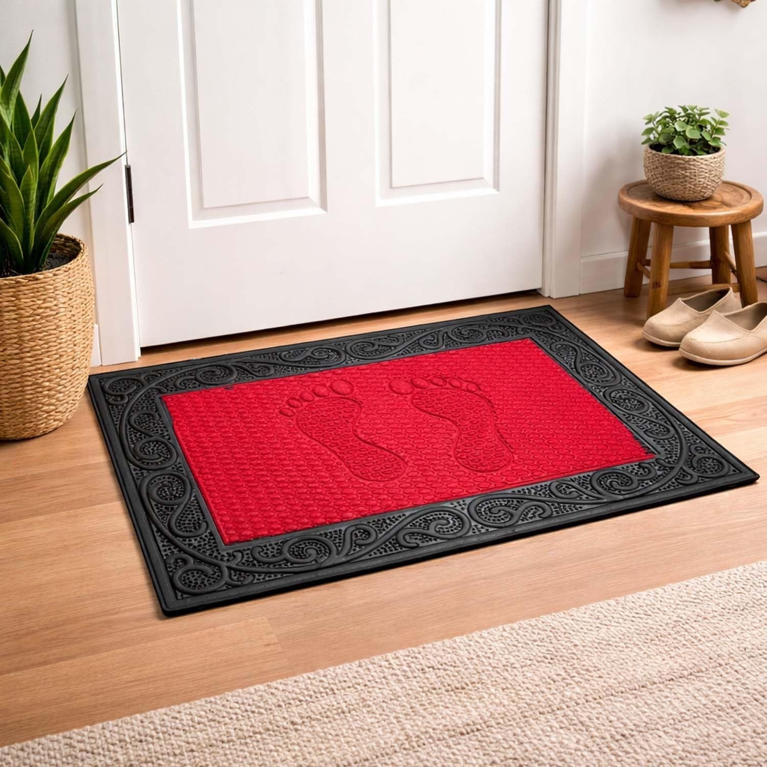 GoHooked red rubber doormat with black ornate border and embossed footprints. Rectangular, 60x37cm.