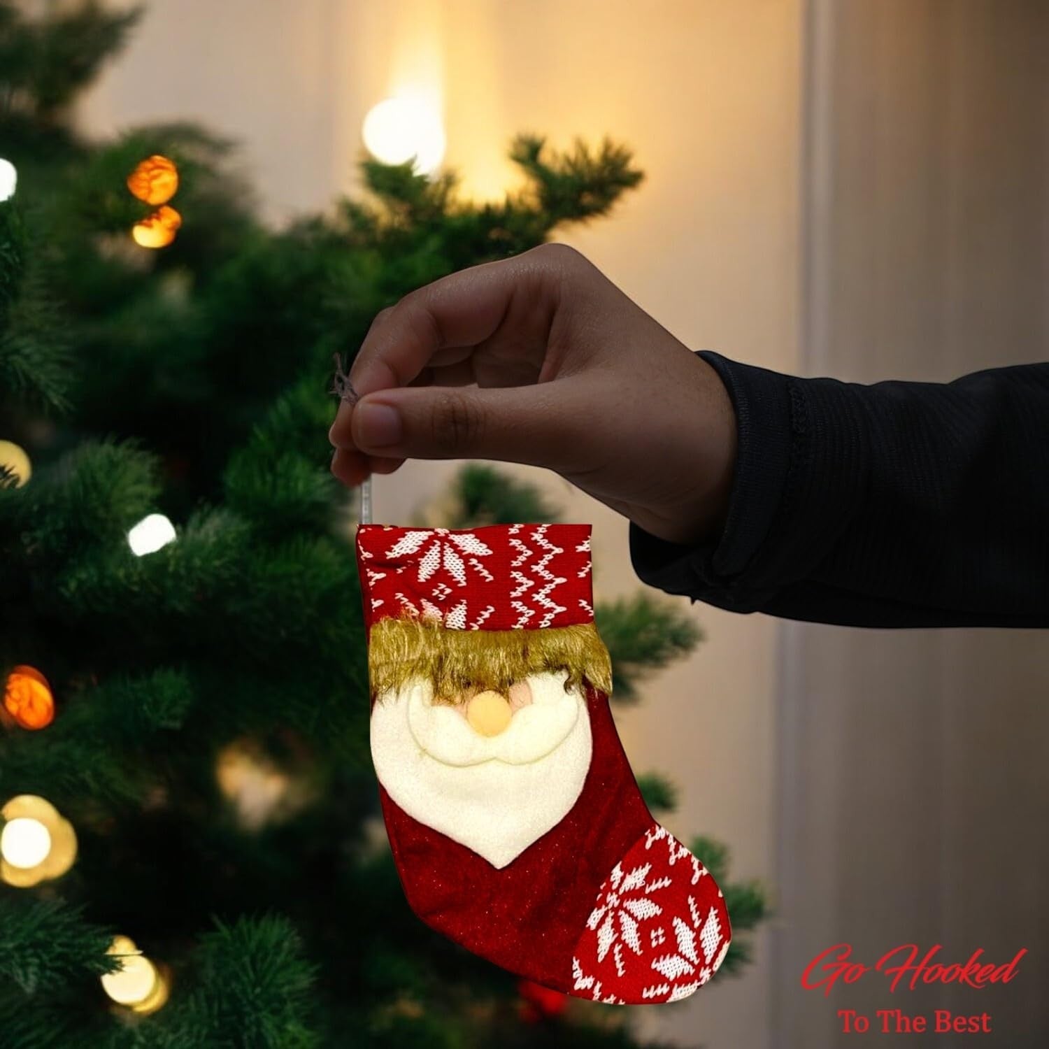 Go Hooked red Santa Claus Christmas stocking ornament with white snowflake pattern and glitter trim.