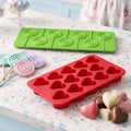 GoHooked red silicone heart-shaped chocolate mold with 11 cavities on a kitchen counter with finished candy treats
