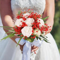 GoHooked red and white artificial baby's breath and rose wedding bouquet with a white ribbon.