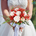 GoHooked red and white artificial baby's breath and rose wedding bouquet with green leaves and a white ribbon.
