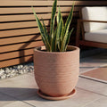 GoHooked Ripper 15-inch round planter pot with tray in brown, made of textured polymer for indoor/outdoor use.