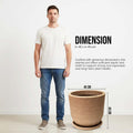 GoHooked 18-inch round brown polymer planter pot with ribbed texture and matching tray. A man stands next to it for scale.