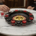 GoHooked black roulette drinking game set with gold spinner and 16 numbered shot glasses, perfect for parties.