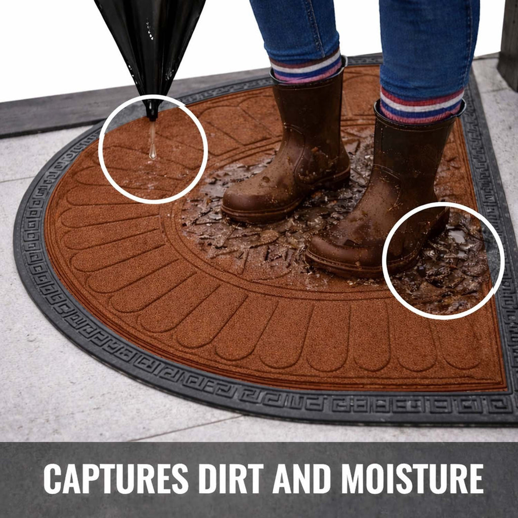 GoHooked semi-circle rubber door mat in brown with black border, capturing dirt and moisture from muddy boots.