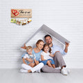 GoHooked brown MDF wood sign with "This is us" quote, hearts, and clips for photos. Rustic farmhouse decor.