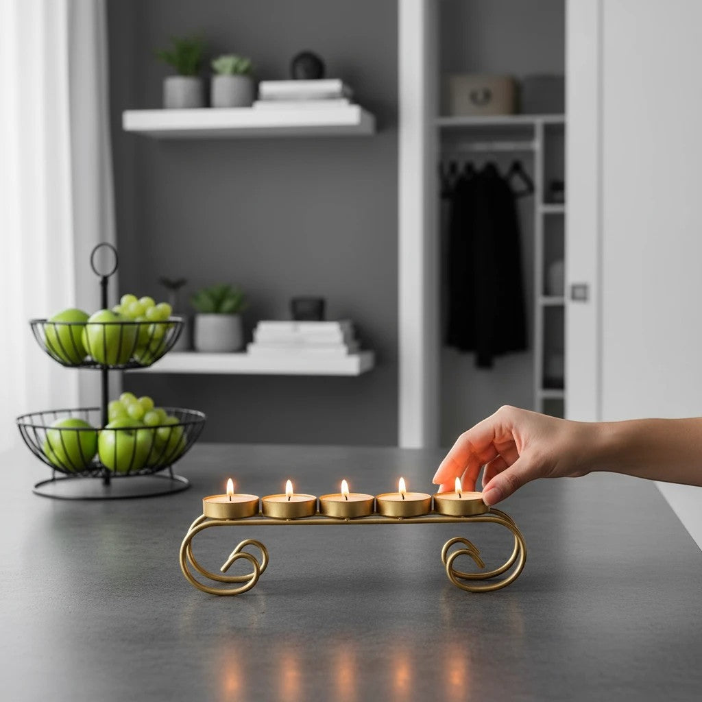 GoHooked handcrafted matte gold iron tealight candle holder with 5 trays and scroll design.
