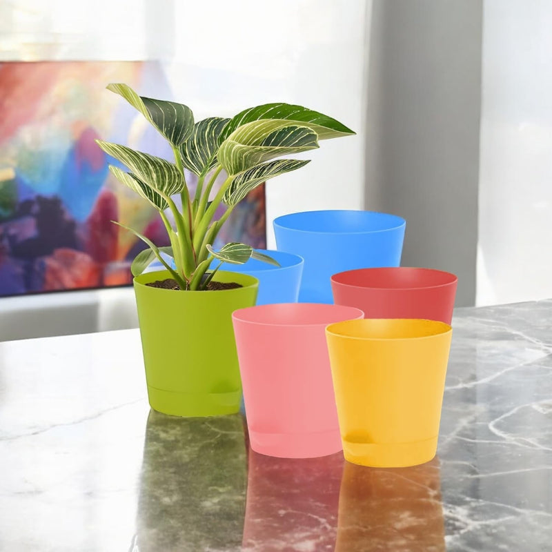 GoHooked 4-inch multicolor plastic self-watering planter pots with UV protection. Set of 6, lightweight and durable for indoor/outdoor gardening.