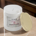 GoHooked white glass jar candle with Serenity Bloom Lotus fragrance, 100ml, hand-poured for aromatherapy.