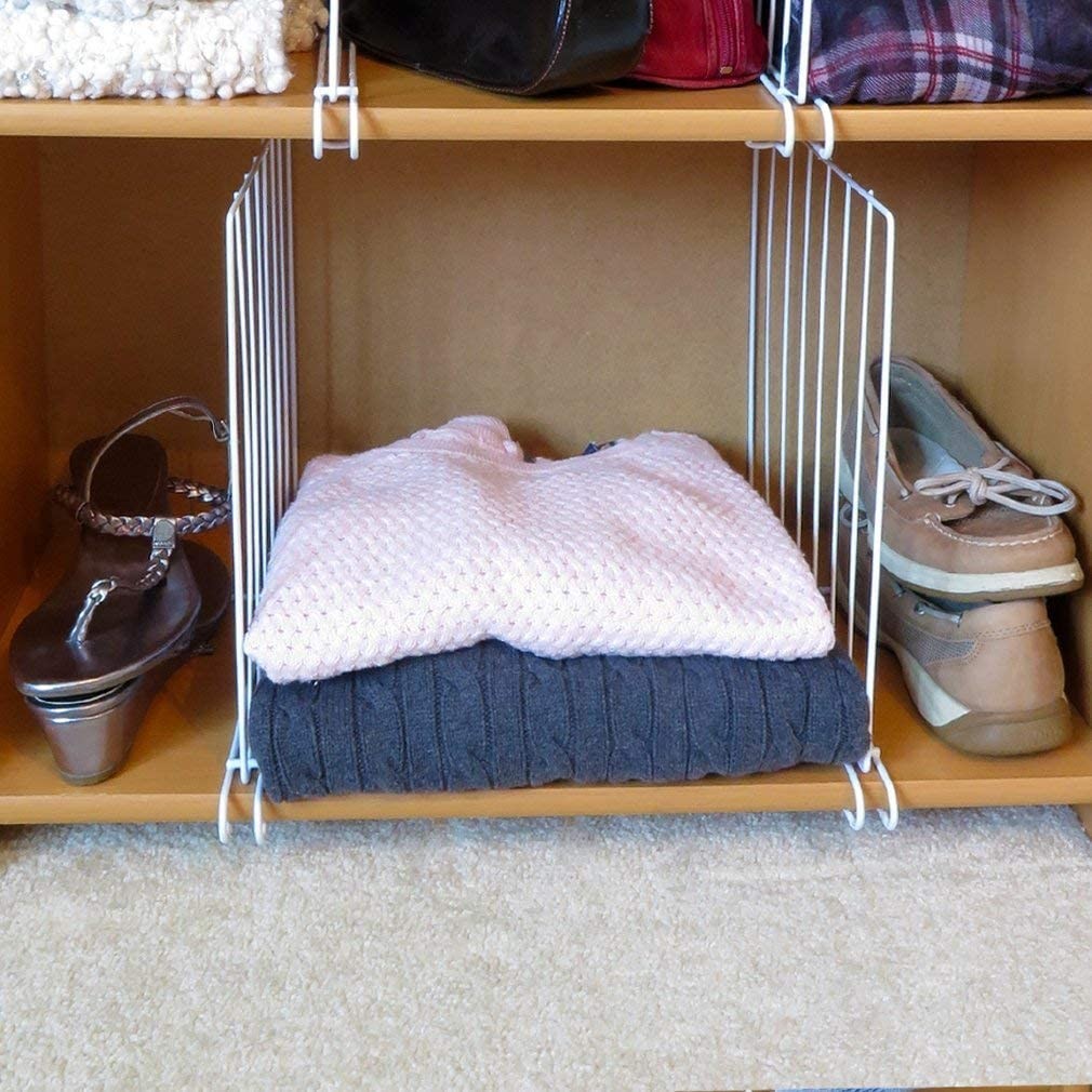 GoHooked white metal shelf dividers organize folded sweaters and shoes in a closet. Set of 2.