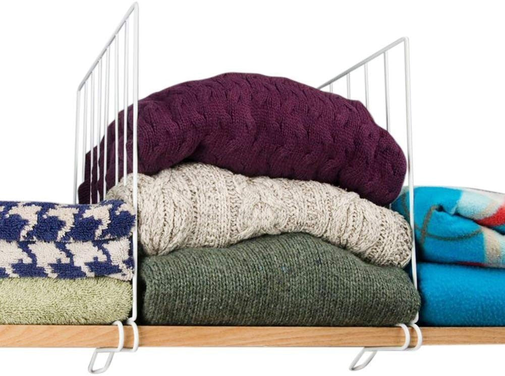 GoHooked white coated iron shelf dividers neatly stack sweaters, blankets, and towels on a wooden shelf.