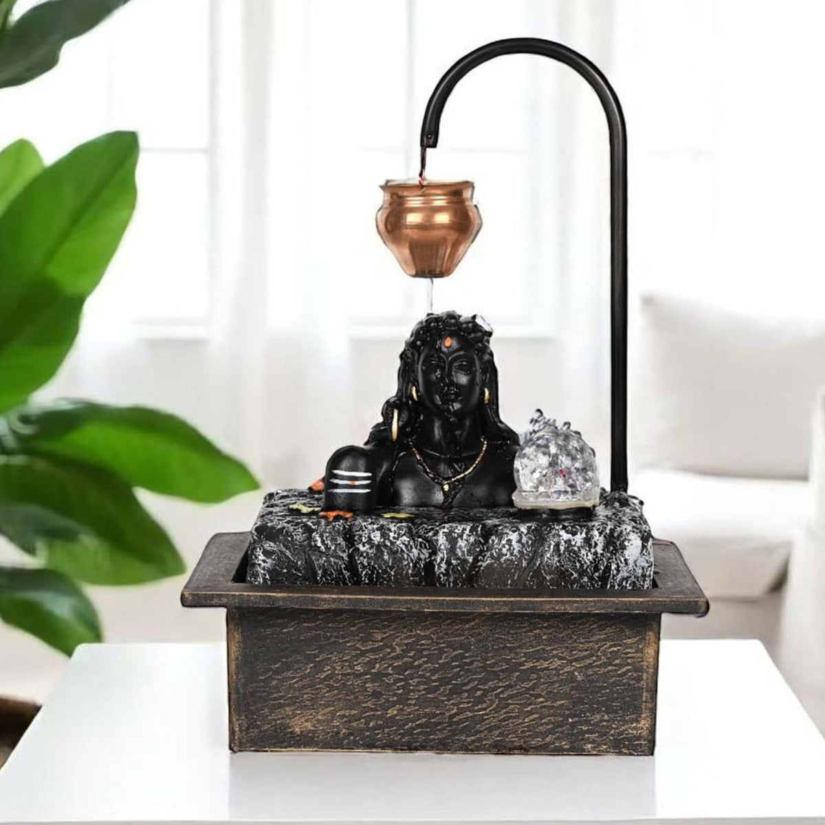 GoHooked matte black polyresin Lord Shiva fountain with copper kalash, LED crystal ball, and waterfall feature.