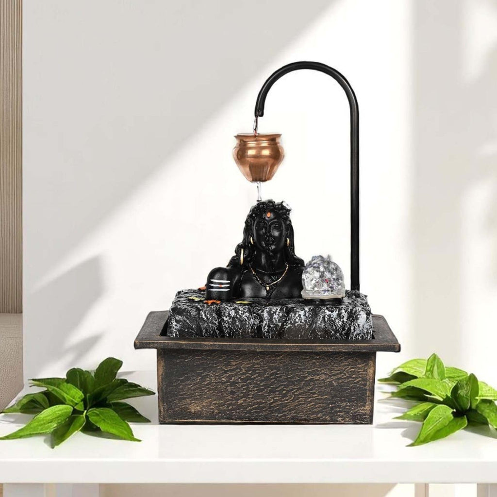 GoHooked matte black polyresin table-top water fountain with Lord Shiva bust, copper kalash, and LED crystal ball.