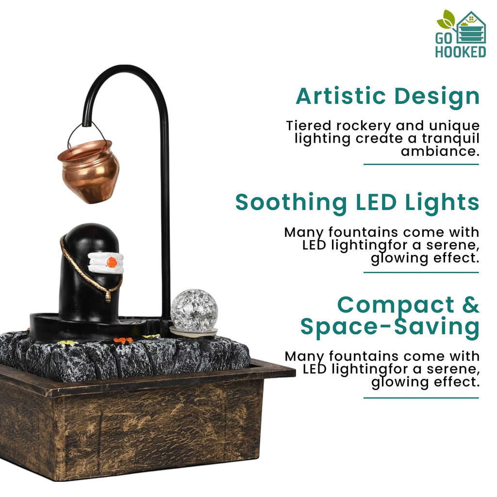 GoHooked Shivling fountain with copper kalash drip, LED crystal ball, and matte black polyresin base. Indoor waterfall for home decor.