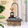 GoHooked Shivling fountain with copper kalash drip, LED crystal ball, and adjustable water flow. Matte black polyresin.