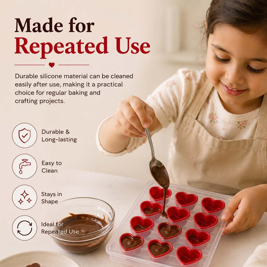 GoHooked silicone heart-shaped chocolate mold with 11 cavities being filled with melted chocolate by a young girl