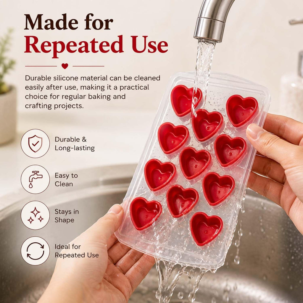 GoHooked red silicone heart-shaped chocolate mold being rinsed under a kitchen faucet for easy cleaning