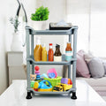Go Hooked silver 3-tier plastic storage rack organizer filled with bottles, toys, and a plant.