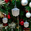Go Hooked silver gift box Christmas ornaments with glitter accents, perfect for festive decor.