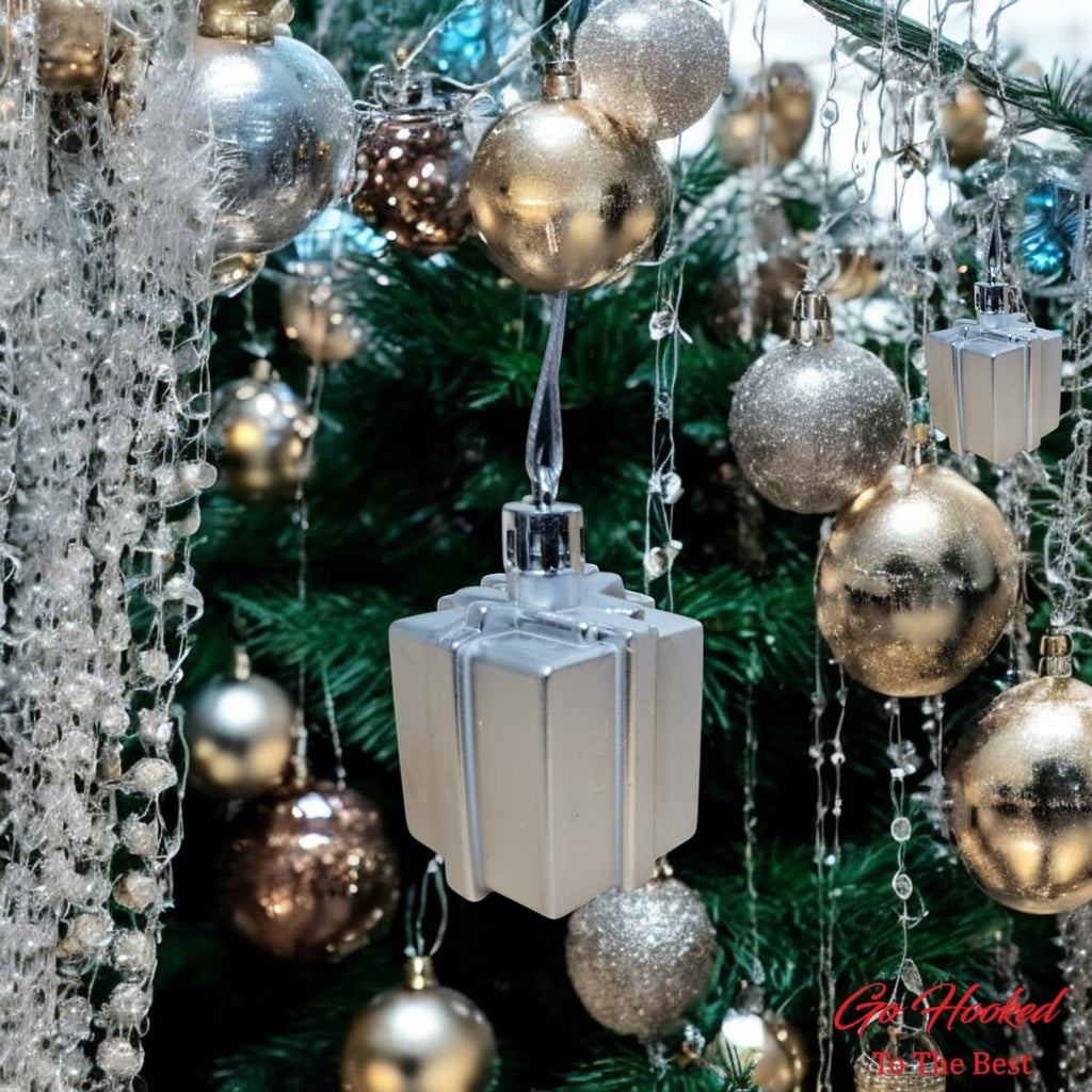 GoHooked silver gift box Christmas ornaments with glitter accents, part of a festive tree decor set.